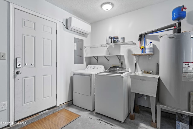 laundry room featuring a wall mounted air conditioner, water heater, laundry area, electric panel, and separate washer and dryer