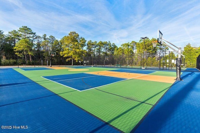 view of sport court with community basketball court and fence