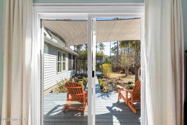 doorway to outside featuring hardwood / wood-style floors