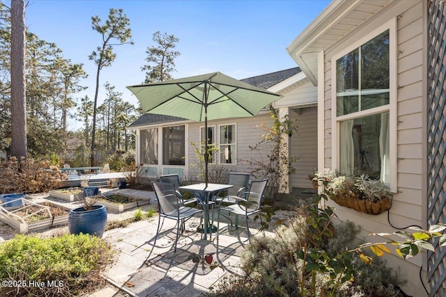 view of patio with a garden