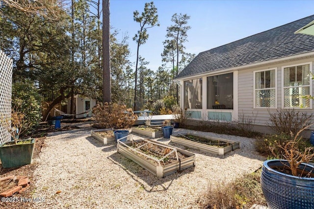 view of yard featuring a garden