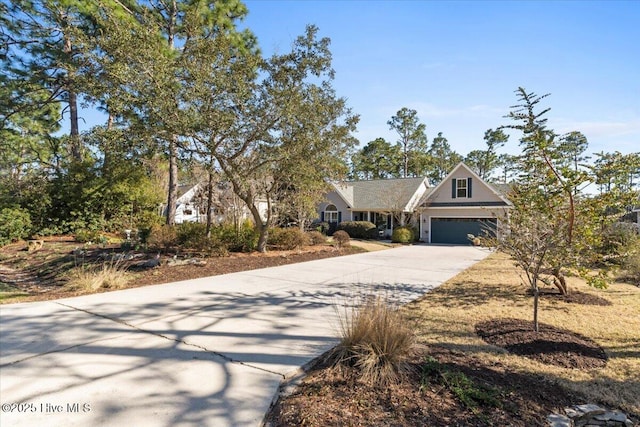 view of front facade featuring a garage and concrete driveway