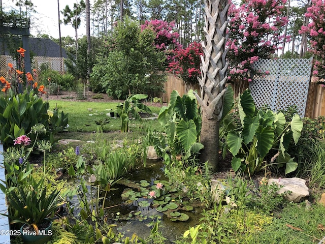 view of yard with fence