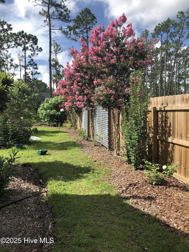 view of yard featuring fence