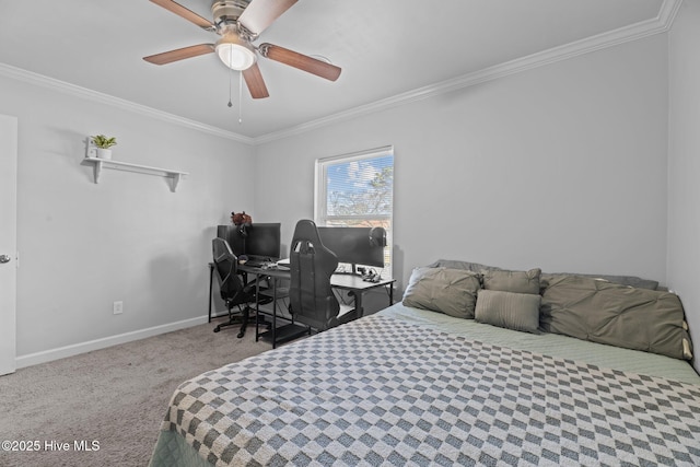 bedroom featuring baseboards, carpet floors, ornamental molding, and a ceiling fan