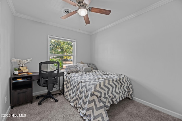 carpeted bedroom with crown molding, baseboards, and ceiling fan