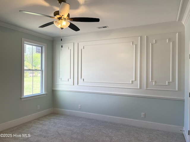 3846 W Wilson St, Farmville, NC 27828 - spare room featuring baseboards, ornamental molding, a ceiling fan, visible vents, and carpet