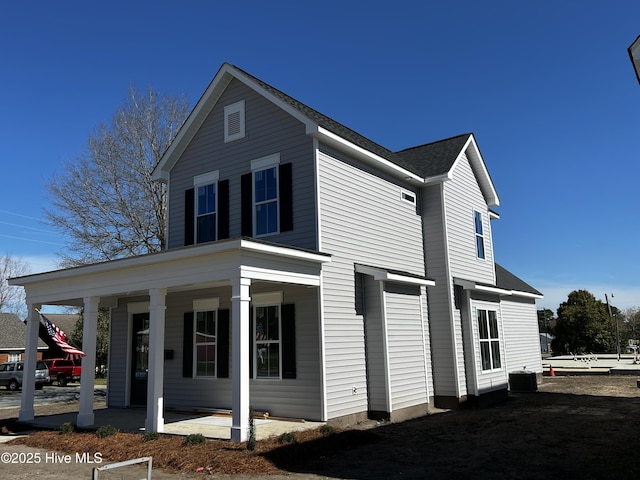 3846 W Wilson St, Farmville, NC 27828 - view of property exterior featuring roof with shingles and covered porch