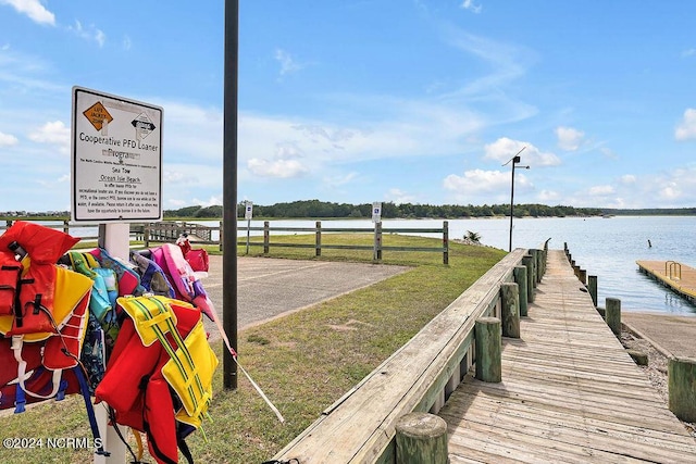 dock area with a water view