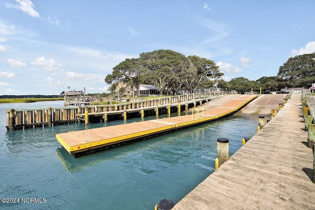 view of dock with a water view