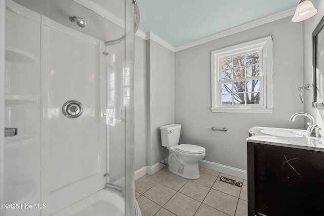 full bathroom with tile patterned floors, toilet, ornamental molding, a shower with door, and baseboards