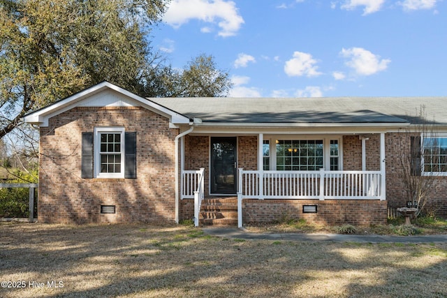 single story home with a front yard, roof with shingles, a porch, crawl space, and brick siding