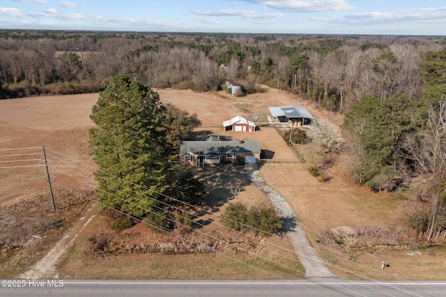 aerial view with a wooded view