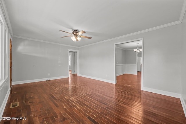 spare room with baseboards, wood-type flooring, ornamental molding, and ceiling fan with notable chandelier