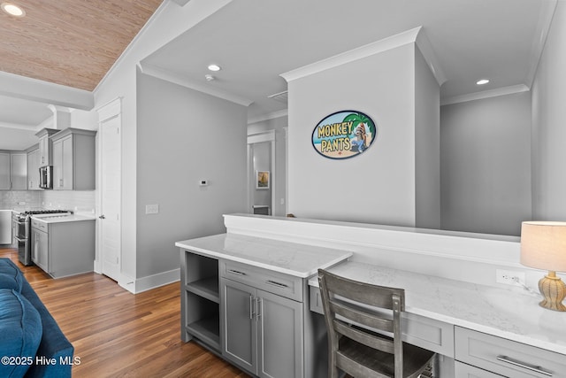 interior space featuring crown molding, tasteful backsplash, stainless steel appliances, and recessed lighting