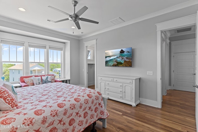 bedroom featuring ornamental molding, recessed lighting, baseboards, visible vents, and dark wood-style floors