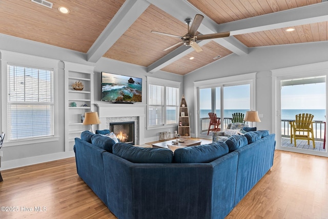 living room with light wood-style floors, baseboards, a warm lit fireplace, wood ceiling, and a ceiling fan