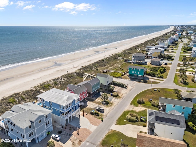 aerial view featuring a water view and a view of the beach