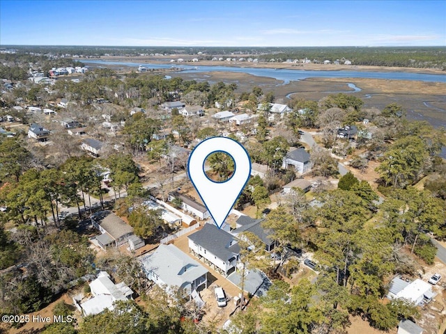 birds eye view of property with a residential view