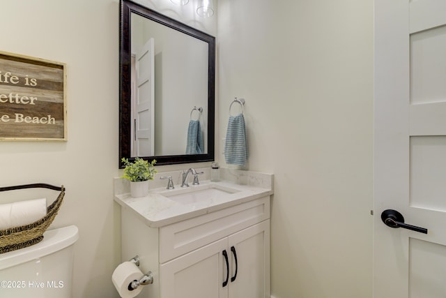 half bath with toilet and vanity