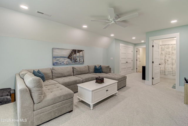 living area featuring visible vents, recessed lighting, lofted ceiling, light colored carpet, and ceiling fan