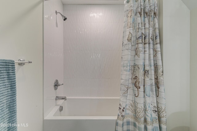 bathroom with shower / tub combo