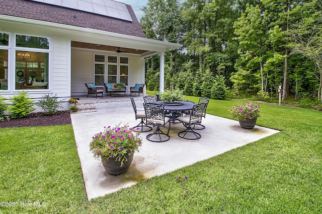 view of patio with an outdoor hangout area and a ceiling fan