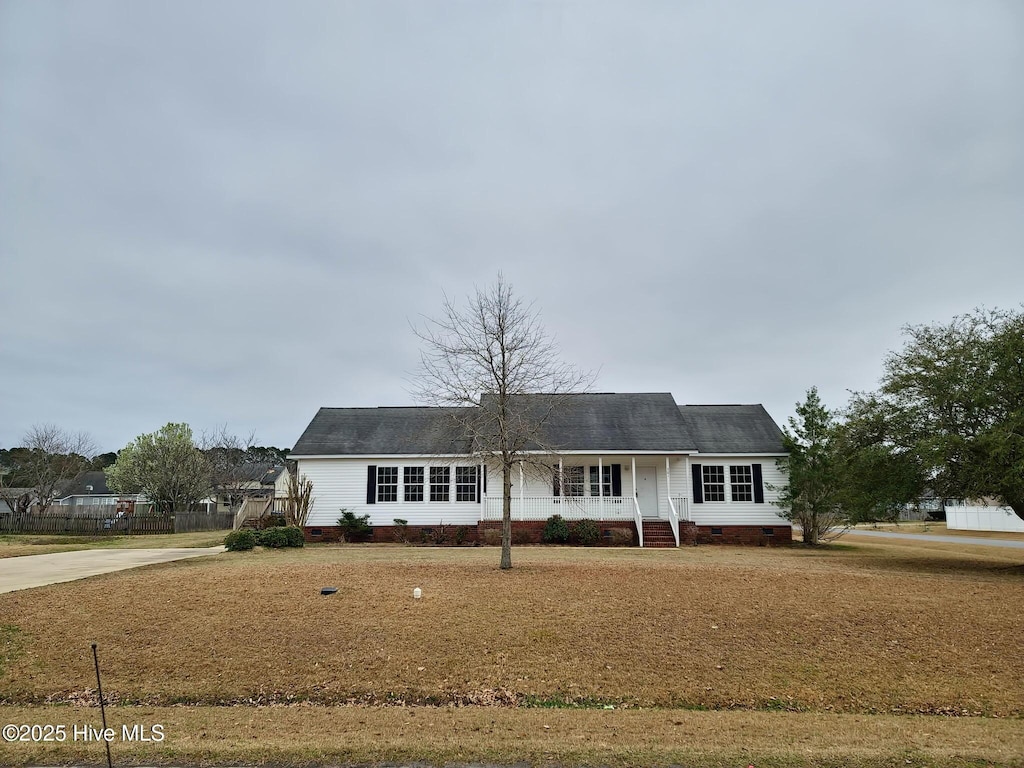 single story home featuring roof with shingles, driveway, and crawl space