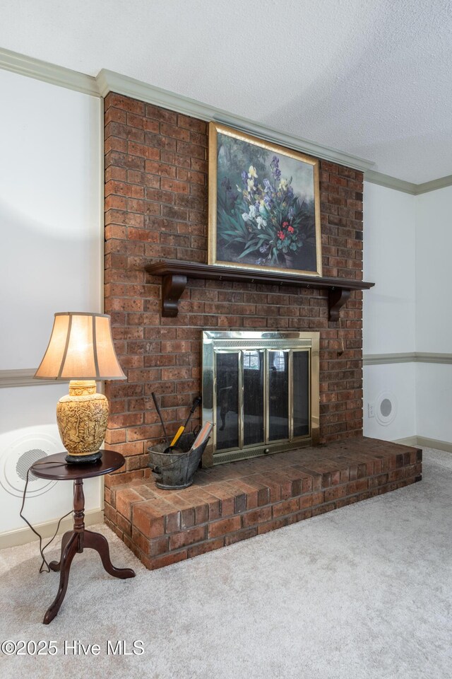 details with a fireplace, crown molding, carpet, and a textured ceiling