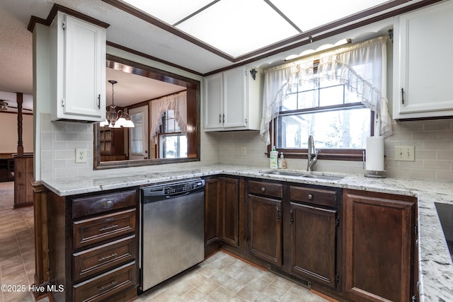 kitchen featuring a notable chandelier, a sink, dark brown cabinetry, white cabinets, and dishwasher