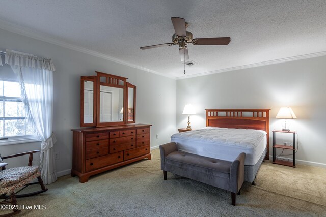 bedroom featuring carpet, visible vents, and ornamental molding