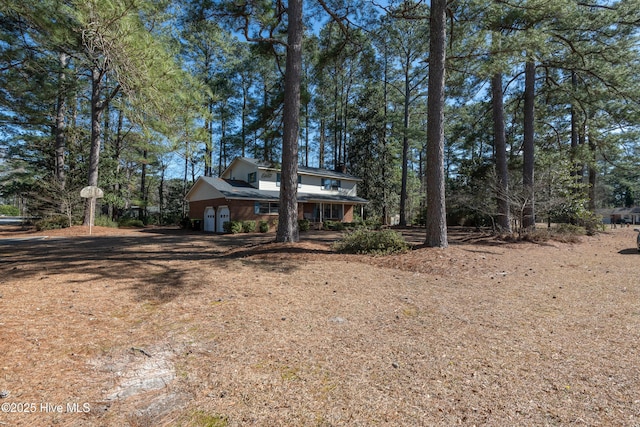 view of front of house featuring an attached garage and driveway