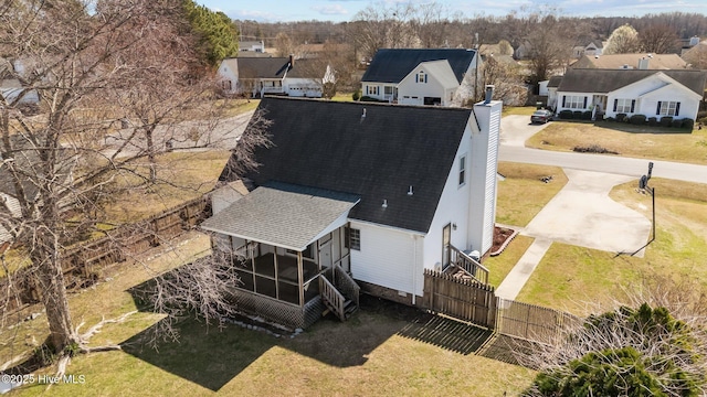 drone / aerial view with a residential view