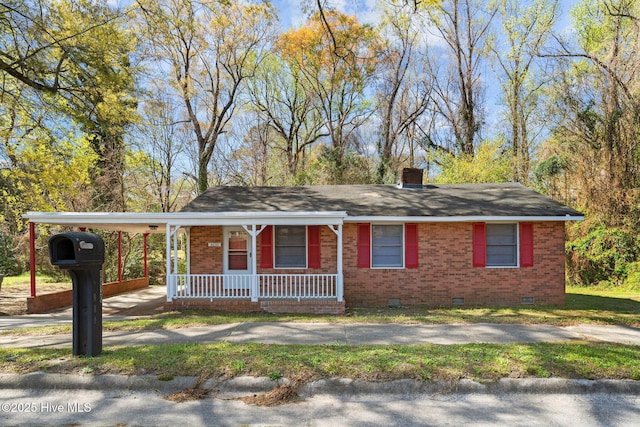 single story home with a porch, a chimney, brick siding, and crawl space