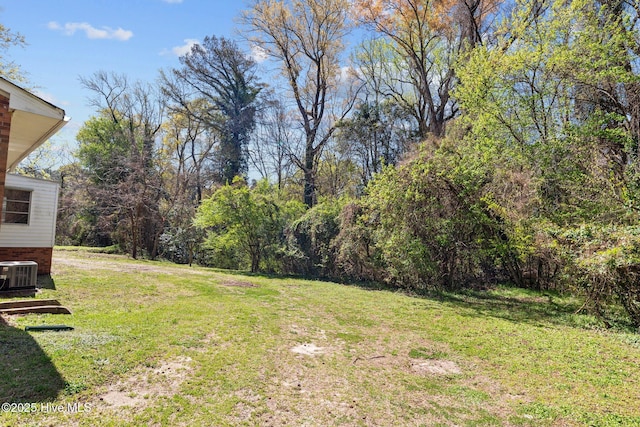 view of yard featuring central AC unit