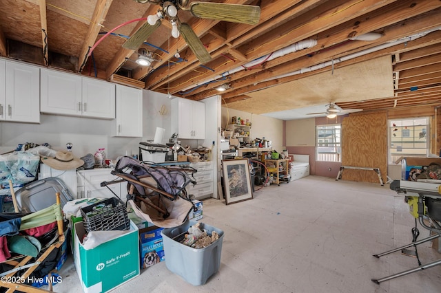 basement with ceiling fan