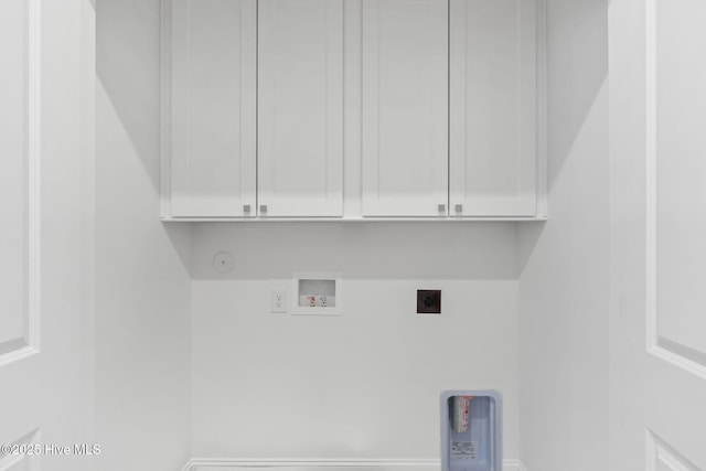 laundry area with gas dryer hookup, washer hookup, hookup for an electric dryer, and cabinet space