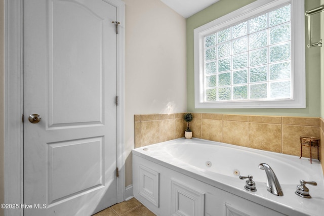 full bath featuring tile patterned floors and a jetted tub