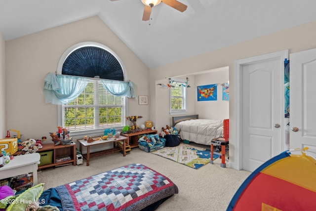 bedroom featuring carpet, ceiling fan, and vaulted ceiling