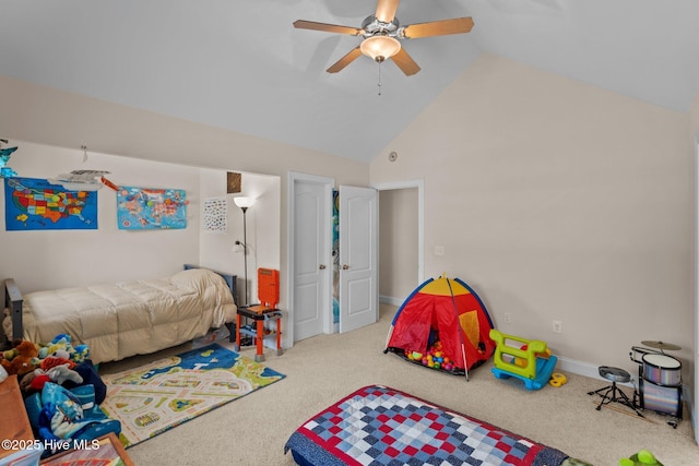 bedroom with a ceiling fan, carpet, baseboards, and high vaulted ceiling