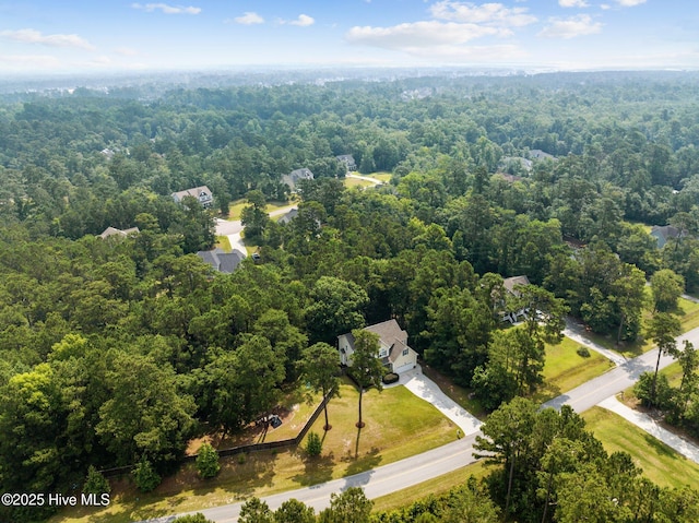 aerial view featuring a forest view