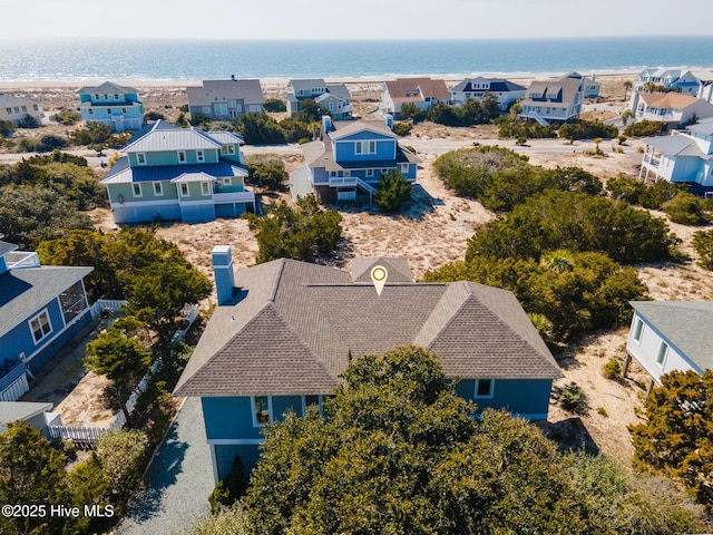 aerial view with a residential view and a water view