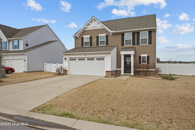 view of front of house featuring stone siding, fence, concrete driveway, an attached garage, and a shingled roof