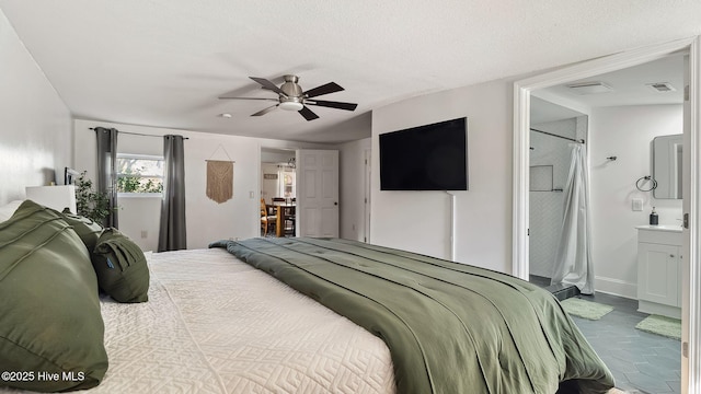 bedroom featuring visible vents, connected bathroom, baseboards, a textured ceiling, and a ceiling fan