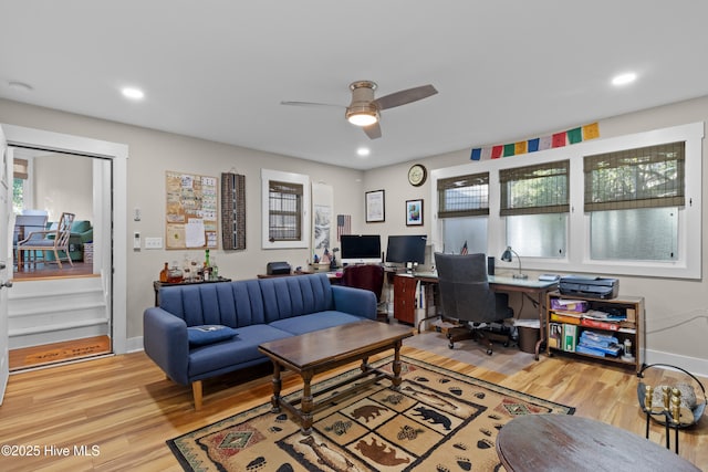 office space featuring recessed lighting, ceiling fan, baseboards, and light wood-style floors