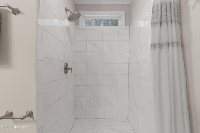 full bathroom with tiled shower