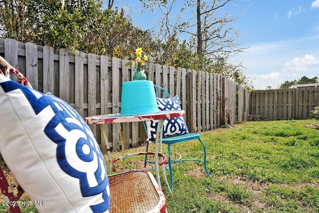 exterior space featuring a fenced backyard