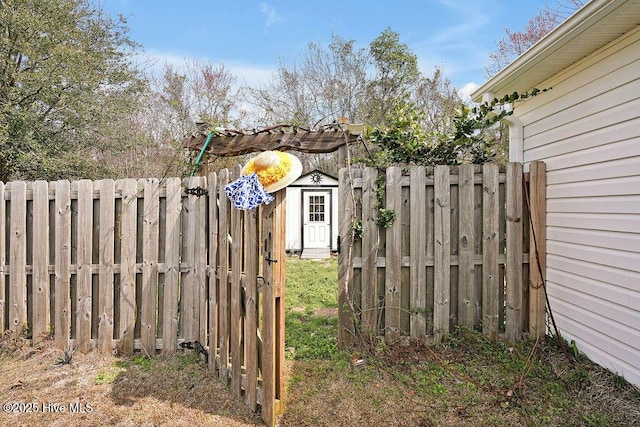 view of yard featuring a gate and fence