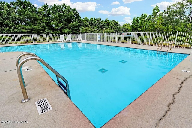 community pool with fence