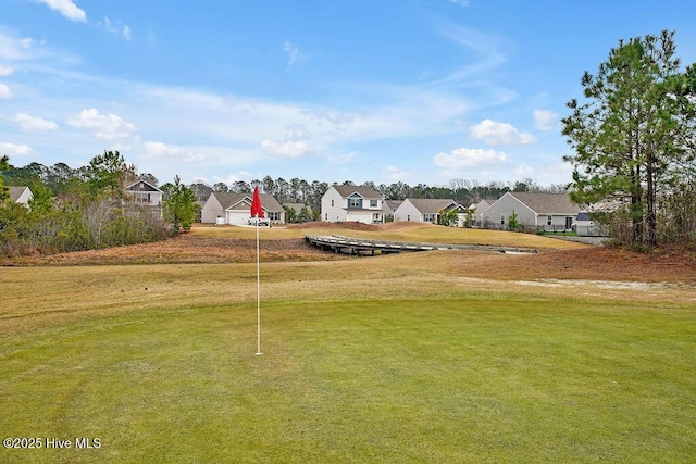view of yard featuring a residential view